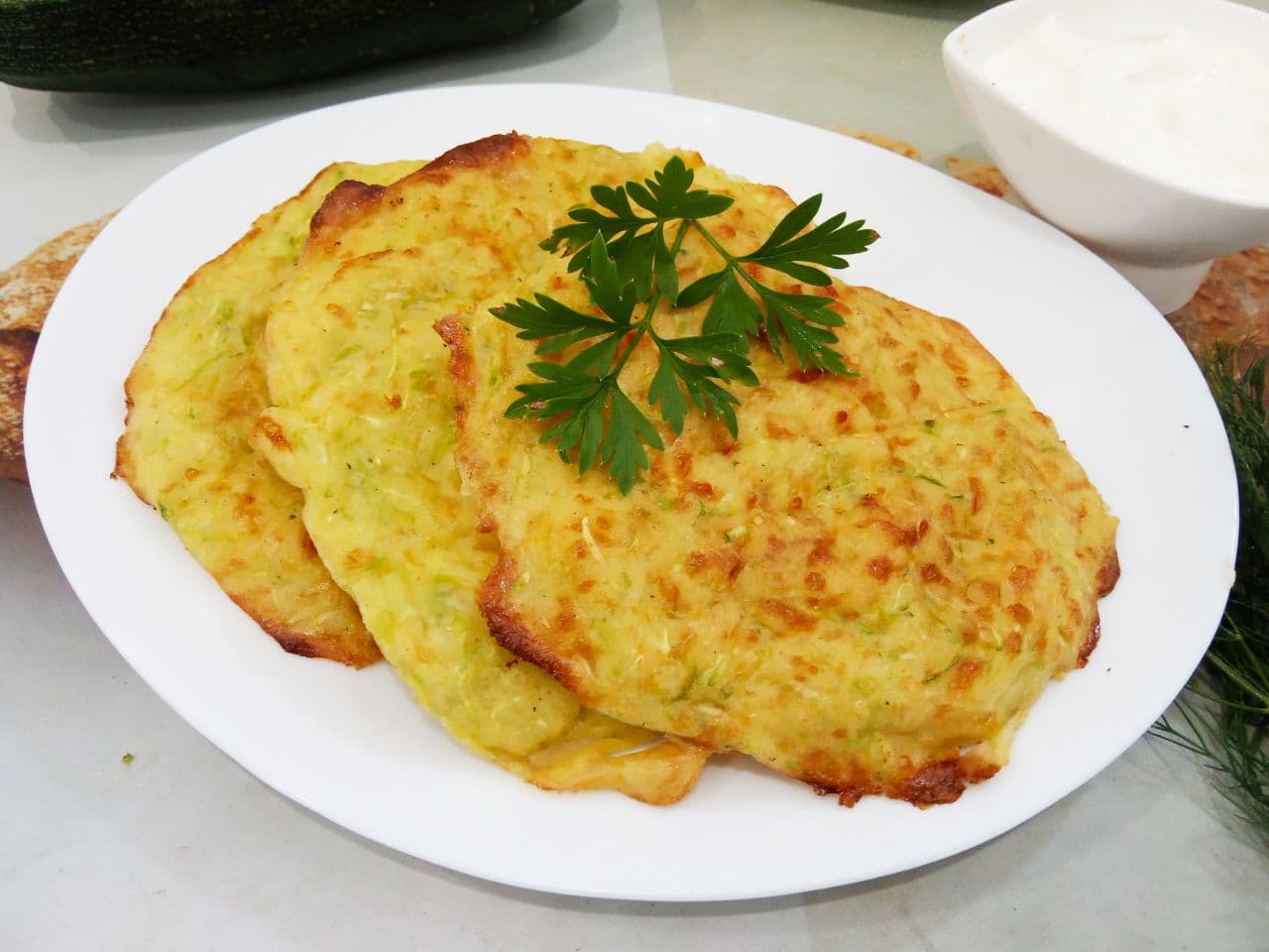 Кабачковые лепешки с сыром и манной крупой запеченные в духовке
