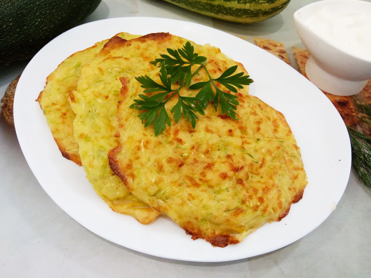 Кабачковые лепешки с сыром и манной крупой запеченные в духовке