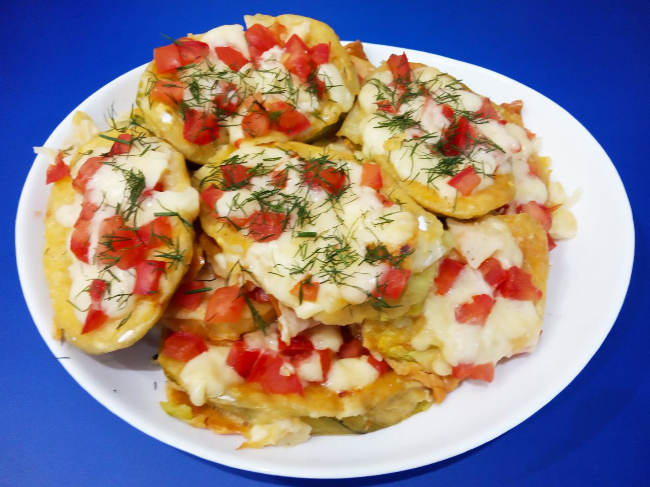 Запеченные кабачки в кляре, с сыром и помидорами